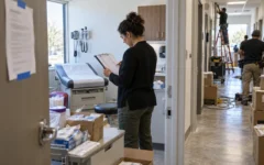 Practice operations lead organizing provider enrollment for a new location